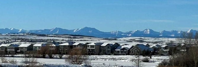 THE MOUNTAINS FROM AIR RANCH OKOTOKS